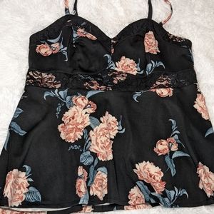 Torrid top black with floral.